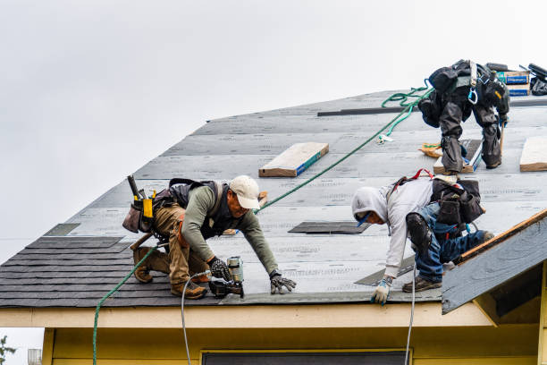 Professional Gutter Installation technician working in Gloversville, NY